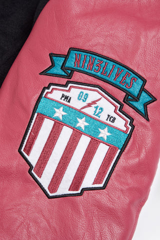 Varsity jacket pink sleeve detail