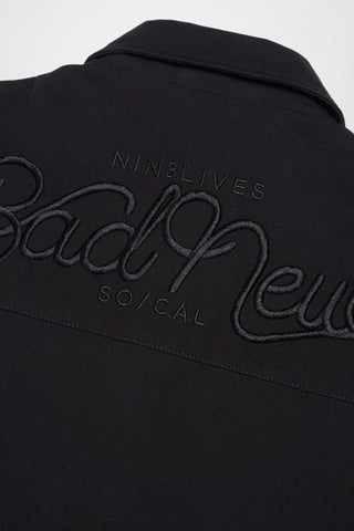 Bad News back detail