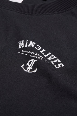 Simple Black tee front logo detail